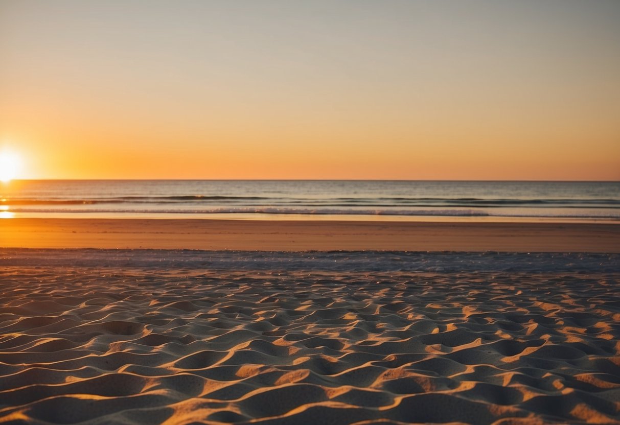 A serene beach at sunset with warm golden light casting long shadows on the sand, creating a dreamy and romantic atmosphere